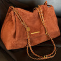 Suede-like women's vintage style shoulder bag in a solid color large capacity design for work and shopping