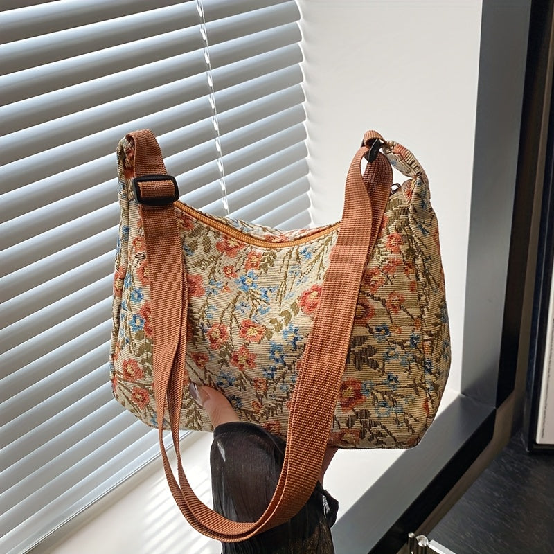 Vintage floral print shoulder bag with a wide comfortable strap and artistic aesthetic design
