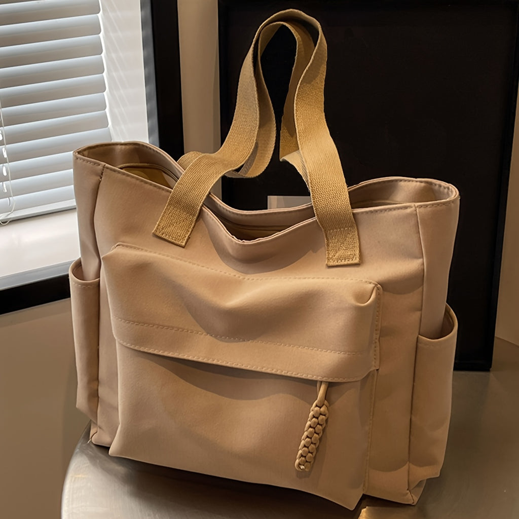 Women's large capacity solid color tote bag with fixed straps and zipper closure for work and travel