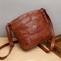 Women's pure brown vintage crossbody bag with multi-pocket layout and spacious interior for work and shopping