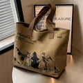 Front view of beige women's canvas tote bag with zipper closure